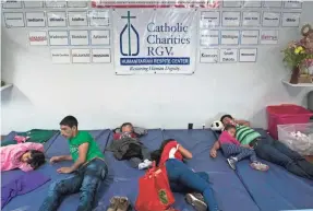  ?? CASEY JACKSON/USA TODAY NETWORK ?? Families sleep on padded mats after being released by immigratio­n officials at a Catholic Charities refugee center in Texas.