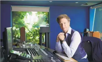  ?? Micha Theiner For The Times ?? GILES MARTIN, seen at Abbey Road Studios, is the son of original Beatles producer George Martin. He has overseen previous remasterin­gs of the Beatles’ “Sgt. Pepper” and the White Album.