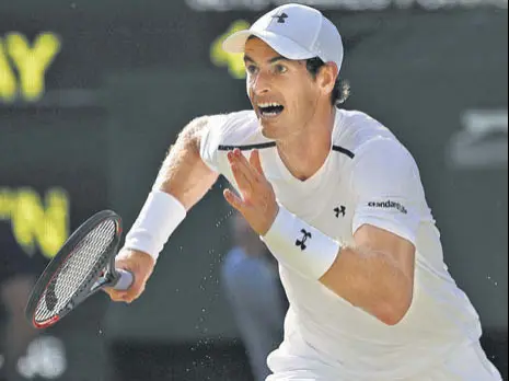  ?? AP ?? Andy Murray runs to make a return to Dustin Brown during their Wimbledon second round match in London on Wednesday.