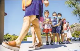  ?? SANDY HUFFAKER ?? San Diego County school and health officials will use a “decision tree” of COVID-19 symptoms that will be used as a guide for potential infections.