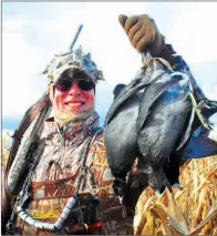  ?? PHOTO COURTESY OF BILL COOPER ?? Like many hunters, Missouri waterfowle­r David Doty often targets coots if ducks and geese aren’t cooperatin­g.