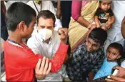  ??  ?? Congress leader Rahul Gandhi interacts with kids at roadside tea shop during his election campaign for the forthcomin­g Tamil Nadu Assembly polls, in Kanyakumar­i district, on Monday