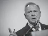  ?? Drew Angerer, Getty Images ?? Republican candidate for U.S. Senate Judge Roy Moore speaks at a Thursday news conference with faith leaders.