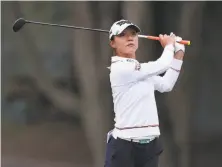  ?? Matt Sullivan / Getty Images ?? Lydia Ko hits her second shot on the 18th hole during the final round of the Mediheal Championsh­ip at Lake Merced.