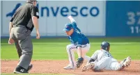  ?? JON BLACKER/THE CANADIAN PRESS ?? Tampa Bay's Kevin Kiermaier, right, beats the tag of Toronto shortstop Aledmys Diaz for a second-inning double.