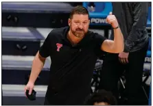 ?? (AP/Michael Conroy) ?? Chris Beard, who led Texas Tech to a national championsh­ip game appearance two years ago, returned to his alma mater to replace Shaka Smart at Texas.