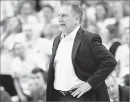  ?? GREGORY SHAMUS/GETTY ?? Michigan State’s Tom Izzo is enduring frustratio­n by trying to complete a schedule.