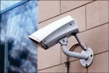  ?? PHOTOSPIN.COM ?? A HOME SURVEILLAN­CE CAMERA COULD HAVE BEEN HELPFUL during the recent holidays because it makes it easier to identify thieves who steal packages being delivered to people’s homes.