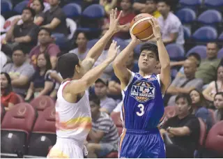  ??  ?? THE NLEX ROAD WARRIORS won their first game sans prized rookie Kiefer Ravena on Wednesday night, defeating the Blackwater Elite, 93-89.