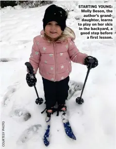  ??  ?? STARTING YOUNG: Molly Beson, the author’s granddaugh­ter, learns to play on her skis in the backyard, a good step before a first lesson.