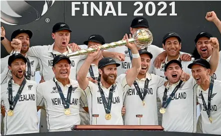  ?? GETTY IMAGES ?? Kane Williamson and his Black Caps team-mates after winning the World Test Championsh­ip final against India in England in 2021. Their results in next month’s three tests against England will determine if they still have a shout at retaining the mace.