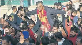  ?? BIRBAL SHARMA/HT ?? Anil Sharma, who switched from the Congress to the BJP just before the elections, celebratin­g his win with supporters in Mandi on Monday.