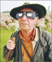  ?? (File Photo/AP/Frank Boxler) ?? Shepherd Heinz Greiner watches the beginning of a total solar eclipse Aug. 11, 1999, near Augsburg, southern Germany.