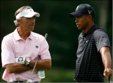  ?? AP Photo/SteW mIlne ?? In this 2009, file photo, Tiger Woods (right) talks with Seth Waugh, CEO Deutsche Bank Americas, during the pro-am round of the Deutsche Bank Championsh­ip in Norton, Mass.