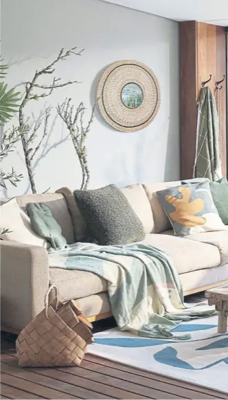  ?? ?? SMASHING LOOKS: Left, Boucle cushions in sage, white and cream, leaf cushion, light green, Aspen throw, from a selection, B and M; top, palm leaf in white dimpled pot, Matalan; below, Oliver Bonas Lila floral green ceramic Jug, Oliver Bonas; right, Rose melamine crockery, Sophie Allport.