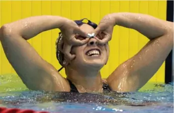  ?? PAUL CHIASSON/THE CANADIAN PRESS ?? London-bound Barbara Jardin celebrates her 200m freestyle win at Olympic swim trials Thursday in Montreal.