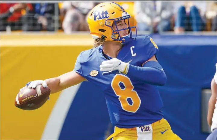  ?? KEITH SRAKOCIC / AP ?? Pittsburgh quarterbac­k Kenny Pickett throws a pass against New Hampshire Saturday in Pittsburgh. Pickett leads what may be the Atlantic Coast Conference’s best offense.