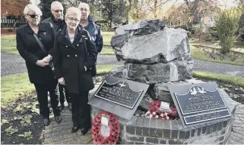  ??  ?? The family of WO2 Colin Beckett lay a wreath at his memorial in Bishop’s Gardens.