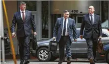  ?? Al Drago / Bloomberg ?? Kevin Downing, left, lead lawyer for former Trump campaign manager Paul Manafort, along with co-counsels Richard Westling, center, and Thomas Zehnle, will put on their defense.