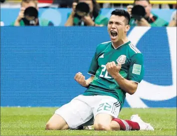 ?? Antonio Calanni Associated Press ?? MEXICO’S HIRVING LOZANO celebrates scoring his team’s opening goal during the Group F match between Germany and Mexico at the 2018 soccer World Cup in Luzhniki Stadium in Moscow, Russia.