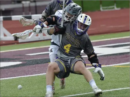  ?? PHOTO BY JOE BOYLE ?? Ballston Spa’s Lucas Bennice grimaces as he attempts to hold off long pole Michael Manning during a Suburban Council tilt at Centennial Field in Burnt Hills in May 2019.