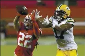  ?? SCOT TUCKER — THE ASSOCIATED PRESS FILE ?? San Francisco 49ers cornerback Jason Verrett (22) intercepts a pass in front of Green Bay Packers wide receiver Davante Adams (17) in Santa Clara on Thursday, Nov. 5, 2020. The 49ers are bringing back Verrett on a one-year deal.