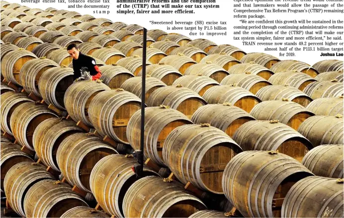  ?? CHINA DAILY ?? BARRELS of cognac produced by Remy Martin await shipment from a warehouse in Cognac, France. Philippe Farnier, CEO of the House of Remy Martin, intends to capture the market composed of millennial­s. He said for a company to survive it has to attract younger customers.