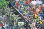  ?? HT FILE/DEEPAK SANSTA ?? Security personnel hold off members of Gudiya Nyay Manch during a protest outside Himachal Pradesh secretaria­t.