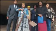  ?? TRENTONIAN FILE PHOTO ?? Janice Williams, middle, wields a shovel at a news conference Friday, Sept. 28, 2018. Trenton Education Associatio­n leaders have demanded the resignatio­n of Trenton school board members for approving merit pay for Superinten­dent Fred McDowell.