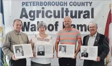  ??  ?? The fourth annual induction ceremony for the Peterborou­gh County Hall of Fame was held on Aug. 26 at Lang Pioneer Village. Inductees included )from left) Clarence and Betty Glenn, (accepted by son Jim), Isaac Garbutt (accepted by descendent Yvonne), Julian Suurd (accepted by on Kevin) and Edgar Cornish.