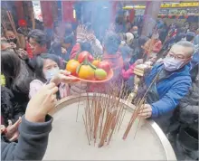  ?? Picture: AP ?? Worshipper­s go to pray at a temple on the first day of the Lunar New Year celebratio­ns, in Taipei, Taiwan, Saturday, February 10, 2024.