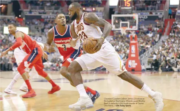  ?? — USA Today Sports ?? Cleveland Cavaliers LeBron James (23) drives to the basket as Washington Wizards guard Bradley Beal (3) defends in the fourth quarter at Capital One Arena.