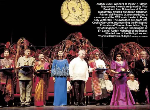  ?? MIGUEL DE GUZMAN ?? ASIA’S BEST: Winners of the 2017 Ramon Magsaysay Awards are joined by Vice President Leni Robredo and Ramon Magsaysay Award Foundation chairman Ramon del Rosario Jr. (center) during a ceremony at the CCP main theater in Pasay City yesterday. The...