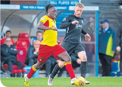  ??  ?? Partick Thistle’s Osman Kakay in action with Nomad’s James Owen