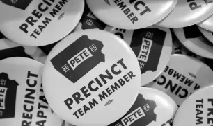  ?? AP ?? In this January 9, 2020 file photo, precinct team member buttons are seen during a caucus training meeting at the local headquarte­rs for Democratic presidenti­al candidate and former South Bend, Indiana, Mayor Pete Buttigieg, in Ottumwa, Iowa.