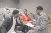  ?? YALONDA M. JAMES/THE COMMERCIAL APPEAL ?? James Johnson (left) of Madison County, and Patricia Coleman of Carroll County meet with Dr. Jerry Woods, vice chairman of the Tennessee education committee for the NAACP.