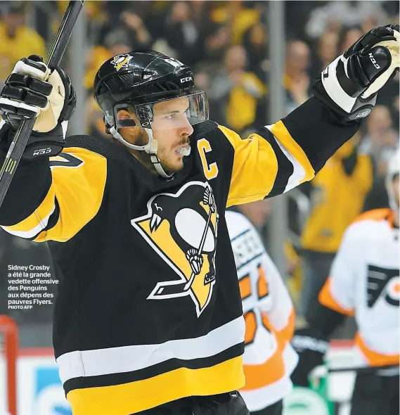  ?? PHOTO AFP ?? Sidney Crosby a été la grande vedette offensive des Penguins aux dépens des pauvres Flyers.