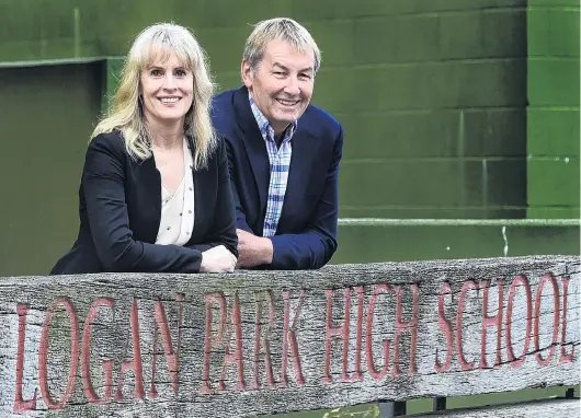  ?? PHOTO: PETER MCINTOSH ?? At the helm . . . Logan Park High School coprincipa­ls Kristan Mouat and Peter Hills, who had to manage New Zealand’s first case of a school pupil with Covid19.