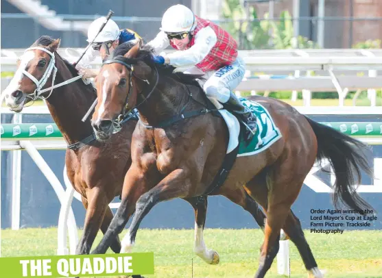  ??  ?? Order Again winning the Lord Mayor's Cup at Eagle Farm Picture: Trackside Photograph­y