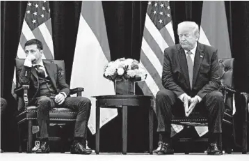  ?? EVAN VUCCI/AP ?? Ukrainian President Volodymyr Zelenskiy, who met President Trump in September, reportedly felt pressure from the Trump team to investigat­e former Vice President Joe Biden.