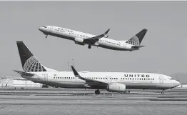  ?? Jeff Chiu / Associated Press ?? United Airlines, which purchased a flight academy, hopes to recruit and train 5,000 pilots this decade, with at least half of them women or people of color.