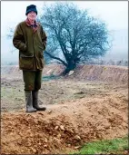  ??  ?? SECURE: Harry Acland stands on a bund, one of many being built on his farm
