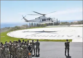  ?? AP/ORIETTA SCARDINO ?? A helicopter carrying Gen. Enzo Vecciarell­i, chief of staff of Italy’s air force, lands Friday at a new heliport at Taormina, Sicily, for the general’s inspection of the site of the Group of Seven summit.