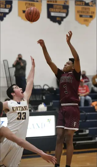  ?? PAUL DICICCO — FOR THE NEWS-HERALD ?? Fairport’s Chris Peoples follows through on a shot against Kirtland in a game earlier this season.