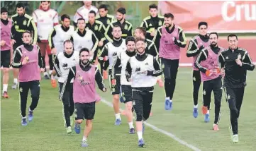  ??  ?? Spain’s players run during a training session at the Sport City training ground in Las Rozas, near Madrid. — AFP photo