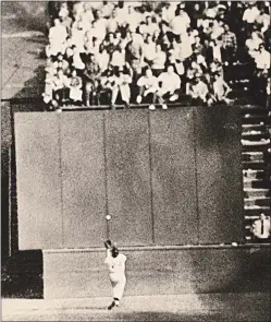  ?? AP FILE PHOTO ?? Giants center fielder Willie Mays makes his famous catch of a drive off the bat of Cleveland’s Vic Wertz at the Polo Grounds in New York on Sept. 29, 1954.