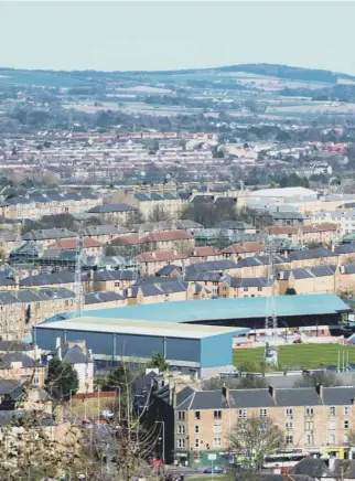  ??  ?? 0 Neighbours and rivals: Dundee’s twin football clubs are separated by just 200 yards but the Dark Blues are planning to move some three miles away, a distance that could be a million miles for Aidan Smith
