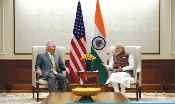  ??  ?? NEW DELHI: US Secretary of State Rex Tillerson (left) listens to Indian Prime Minister Narendra Modi at the Prime Minister’s residence in New Delhi yesterday.— AFP