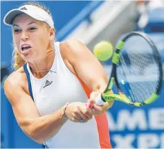  ??  ?? Caroline Wozniacki hits to Svetlana Kuznetsova on day three of the US Open tennis tournament at USTA Billie Jean King National Tennis Centre. — USA TODAY Sports
