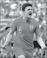  ?? AP/FRANCISCO SECO ?? Harry Maguire celebrates after scoring England’s first goal during Saturday’s 2-0 victory over Sweden in the World Cup quarterfin­als.